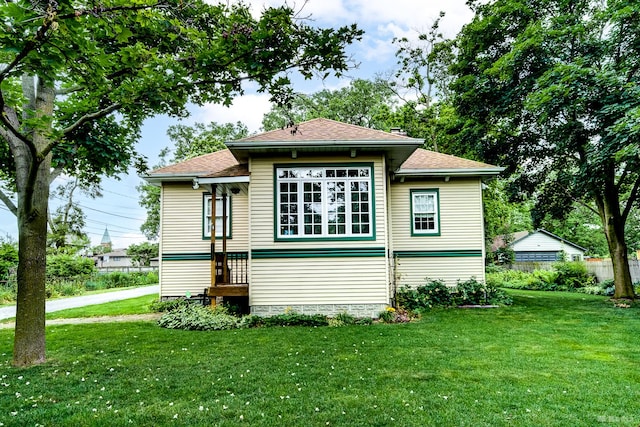 14723 Kildare Ave, Midlothian, IL 60445 - rear view of property featuring a shingled roof