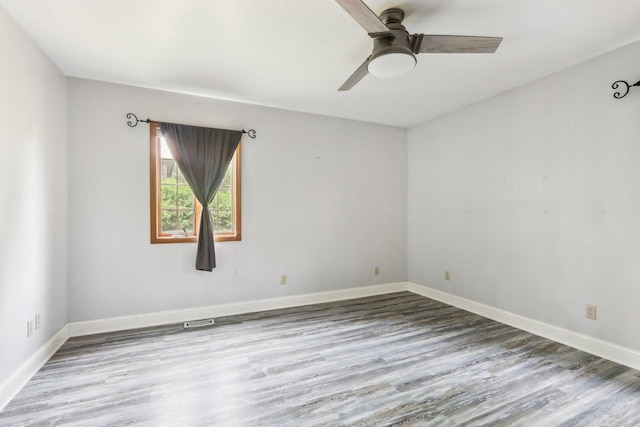1888 Irene Rd, Sandwich, IL 60548 - unfurnished room with wood finished floors and a ceiling fan