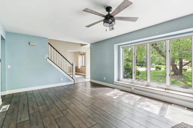 1888 Irene Rd, Sandwich, IL 60548 - unfurnished living room featuring stairs, a ceiling fan, and dark wood finished floors