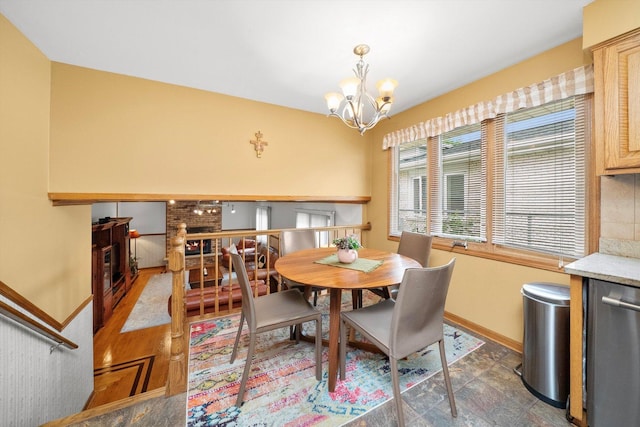 7542 Mason Ave, Burbank, IL 60459 - dining room featuring a chandelier and baseboards