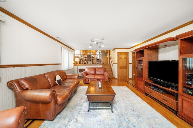 7542 Mason Ave, Burbank, IL 60459 - living room featuring wood finished floors, wainscoting, stairway, and crown molding