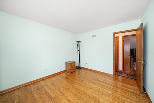 7542 Mason Ave, Burbank, IL 60459 - spare room featuring light wood-type flooring