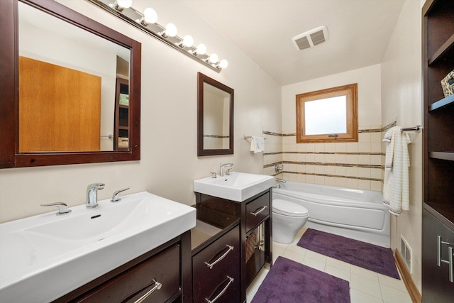 7542 Mason Ave, Burbank, IL 60459 - bathroom featuring two vanities and tile patterned floors