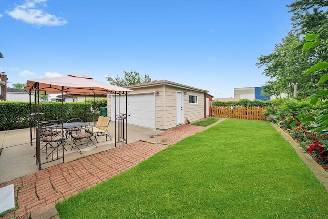 7542 Mason Ave, Burbank, IL 60459 - view of yard with a detached garage, a gazebo, an outdoor structure, and a patio area