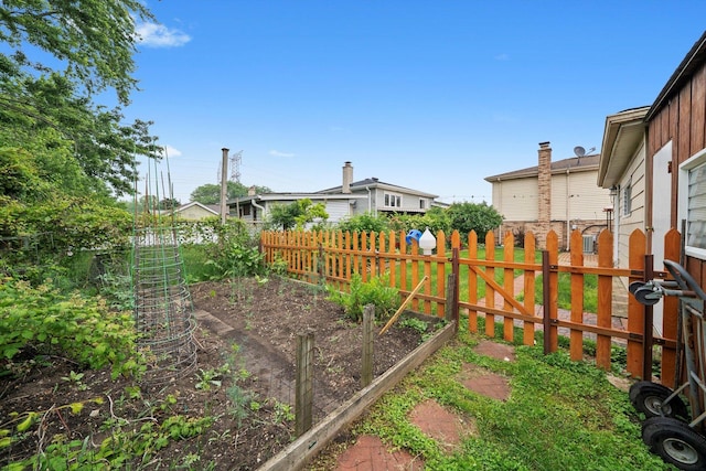 7542 Mason Ave, Burbank, IL 60459 - fenced backyard with a vegetable garden
