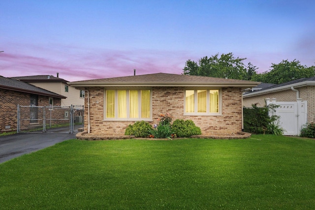 7542 Mason Ave, Burbank, IL 60459 - view of front of home with a gate and brick siding