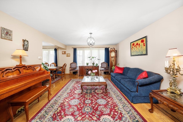 7542 Mason Ave, Burbank, IL 60459 - living area featuring wood finished floors and a chandelier