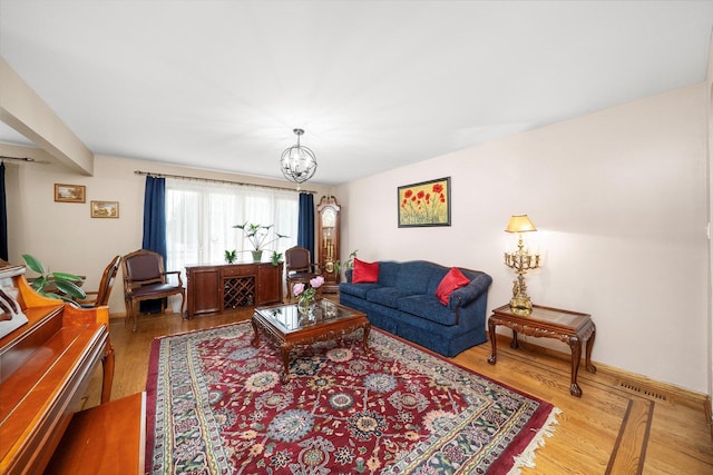 7542 Mason Ave, Burbank, IL 60459 - living area featuring a chandelier and wood finished floors