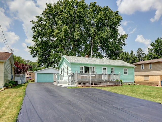 1806 New High St, Rock Falls, IL 61071 - single story home with an outdoor structure, a garage, a chimney, and a deck