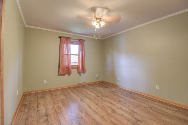 1806 New High St, Rock Falls, IL 61071 - empty room featuring light wood-style flooring, a ceiling fan, and crown molding