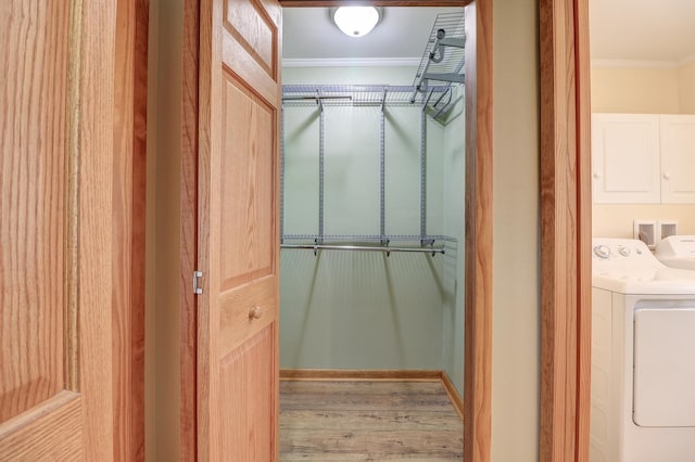 1806 New High St, Rock Falls, IL 61071 - spacious closet featuring washing machine and dryer and wood finished floors