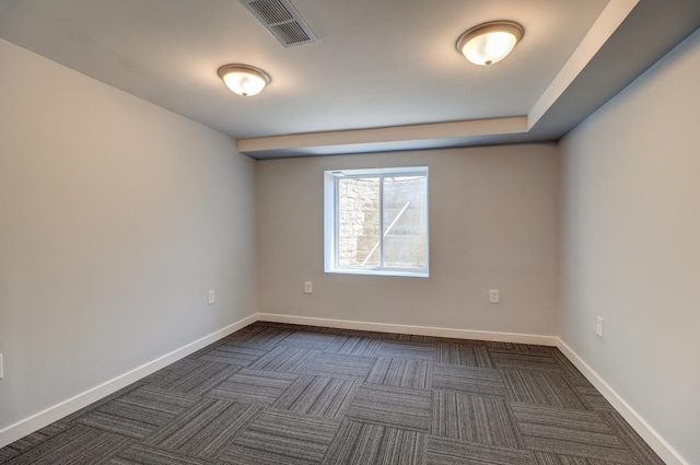 1806 New High St, Rock Falls, IL 61071 - spare room featuring dark carpet and baseboards