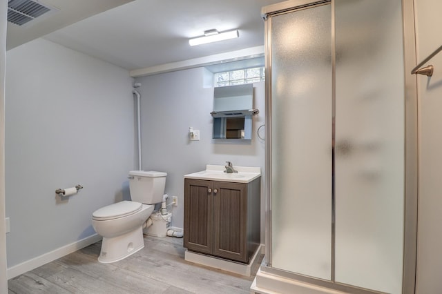 1806 New High St, Rock Falls, IL 61071 - bathroom with vanity, a stall shower, and wood finished floors