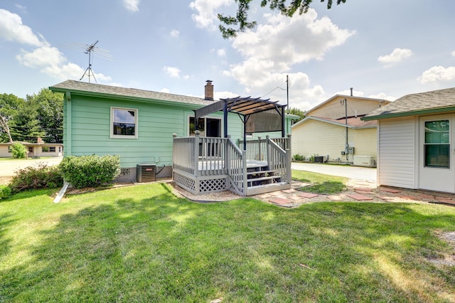 1806 New High St, Rock Falls, IL 61071 - back of house featuring a pergola, a deck, a chimney, and a yard