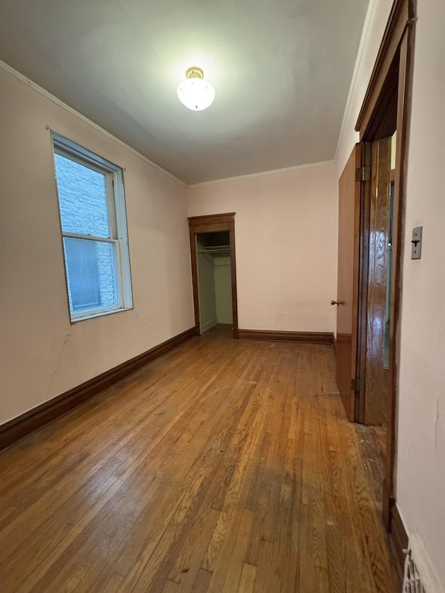 2130 W Concord Pl, Chicago, IL 60647 - spare room featuring wood-type flooring and ornamental molding