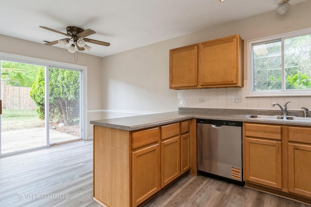 5S730 Malibu Ln, Naperville, IL 60540 - kitchen with dishwasher, a peninsula, light wood-type flooring, a ceiling fan, and tasteful backsplash