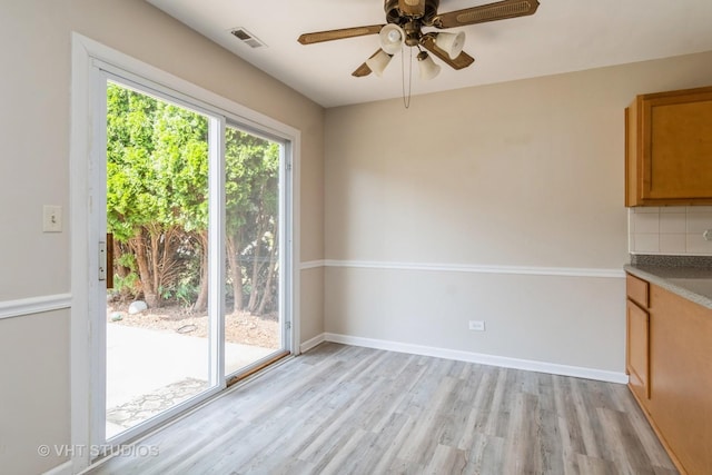 5S730 Malibu Ln, Naperville, IL 60540 - unfurnished dining area with light wood finished floors and ceiling fan
