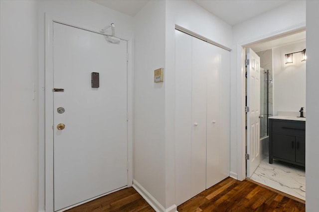 8916 Kenneth Dr Unit 1E, Des Plaines, IL 60016 - foyer with dark wood-style flooring