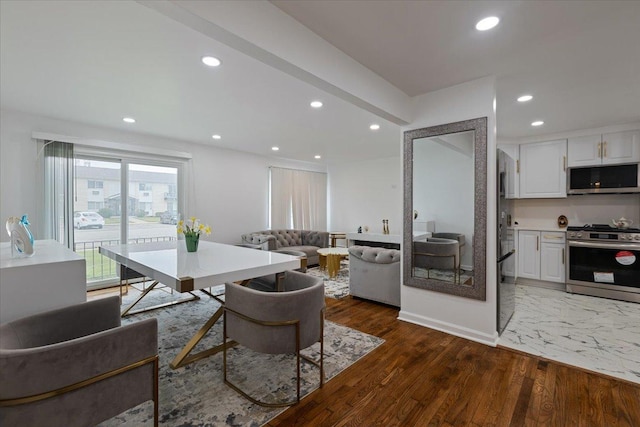 8916 Kenneth Dr Unit 1E, Des Plaines, IL 60016 - dining room with recessed lighting and wood finished floors