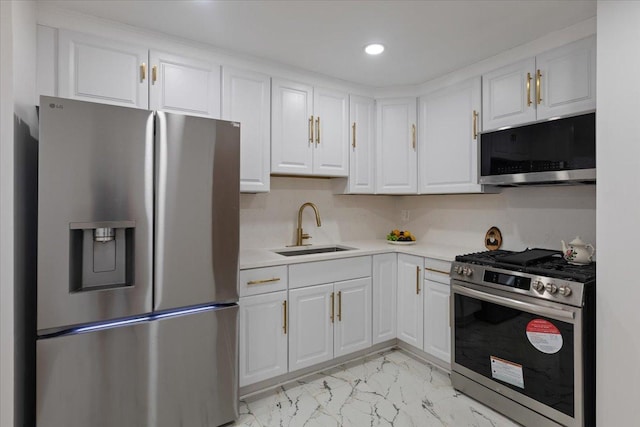 8916 Kenneth Dr Unit 1E, Des Plaines, IL 60016 - kitchen with stainless steel appliances, light marble finish flooring, light countertops, white cabinets, and recessed lighting