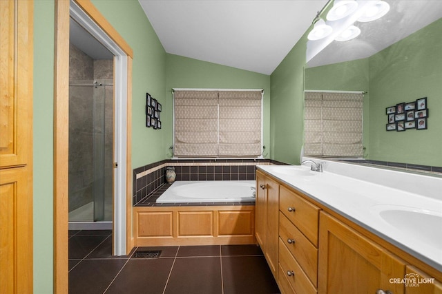 189 Cross St, Sugar Grove, IL 60554 - bathroom featuring tile patterned flooring, a garden tub, a shower stall, double vanity, and lofted ceiling