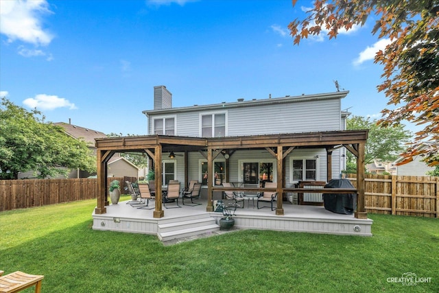 189 Cross St, Sugar Grove, IL 60554 - back of house with a chimney, a fenced backyard, and a wooden deck