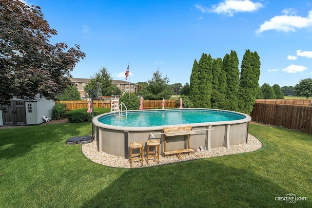 189 Cross St, Sugar Grove, IL 60554 - view of swimming pool featuring a fenced backyard and a storage unit
