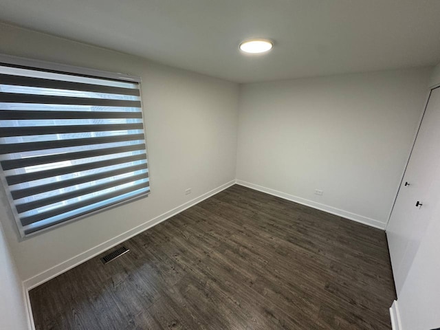 1805 Marquette Ln, Hoffman Estates, IL 60169 - unfurnished room featuring dark wood-style floors and baseboards