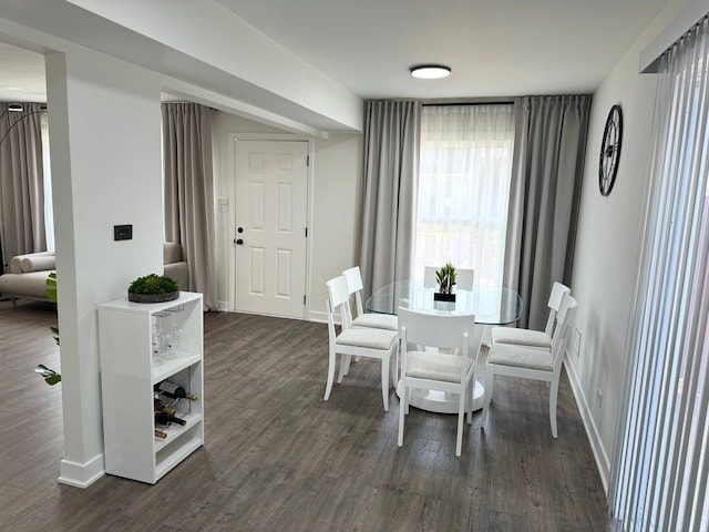 1805 Marquette Ln, Hoffman Estates, IL 60169 - dining area featuring dark wood-type flooring and baseboards