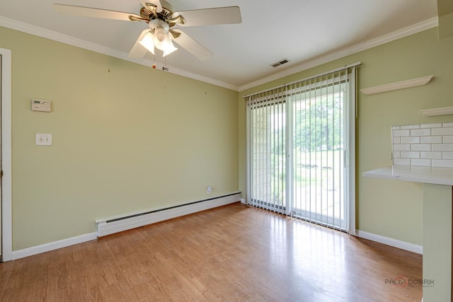 38W333 Oakwood Dr, Saint Charles, IL 60175 - spare room with a baseboard radiator, wood finished floors, ornamental molding, and a ceiling fan