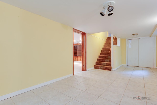 38W333 Oakwood Dr, Saint Charles, IL 60175 - empty room with stairway and light tile patterned flooring