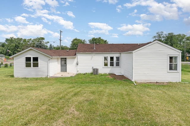 148 E Francis Rd, New Lenox, IL 60451 - back of house featuring a lawn and roof with shingles