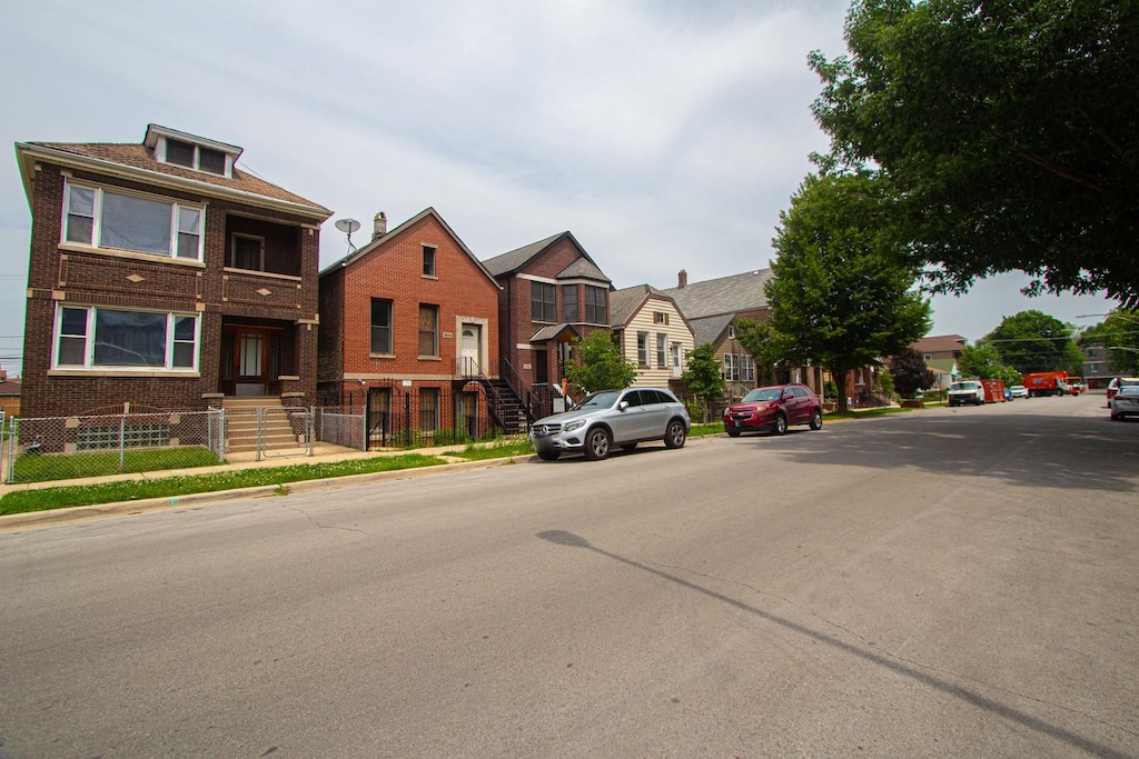 1044 W 34th Pl, Chicago, IL 60608 - view of front facade featuring brick siding and a residential view