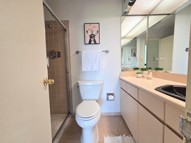6833 N Kedzie Ave Unit 816, Chicago, IL 60645 - bathroom featuring vanity, tile patterned flooring, and tiled shower
