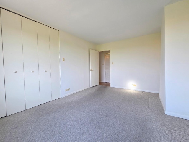 6833 N Kedzie Ave Unit 816, Chicago, IL 60645 - unfurnished bedroom with carpet and a closet