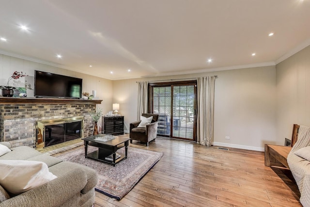 4116 N Terramere Ave, Arlington Heights, IL 60004 - living room featuring light wood-style floors, a fireplace, ornamental molding, and recessed lighting