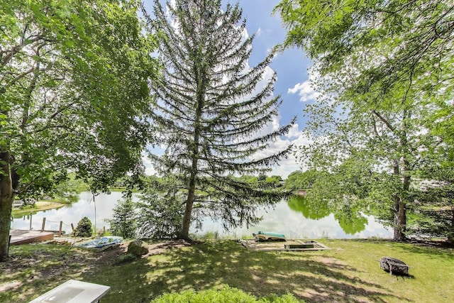4116 N Terramere Ave, Arlington Heights, IL 60004 - view of grassy yard with a water view, a dock, and an outdoor fire pit