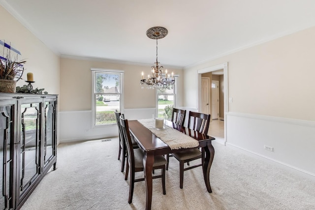 4116 N Terramere Ave, Arlington Heights, IL 60004 - dining space with a chandelier, light carpet, and ornamental molding