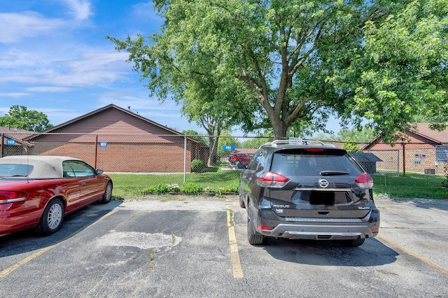 5848 W 76th Pl N Unit 203, Burbank, IL 60459 - view of home's exterior with uncovered parking