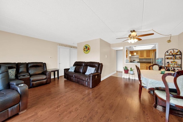 5848 W 76th Pl N Unit 203, Burbank, IL 60459 - living room with a ceiling fan and wood finished floors