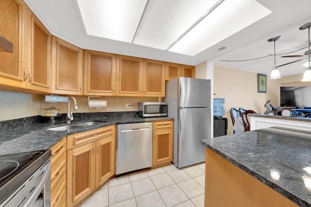 5848 W 76th Pl N Unit 203, Burbank, IL 60459 - kitchen featuring stainless steel appliances, light tile patterned floors, dark stone counters, a ceiling fan, and pendant lighting