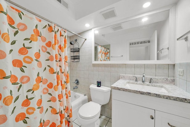 5848 W 76th Pl N Unit 203, Burbank, IL 60459 - bathroom with tile walls, vanity, shower / bath combination with curtain, decorative backsplash, and recessed lighting