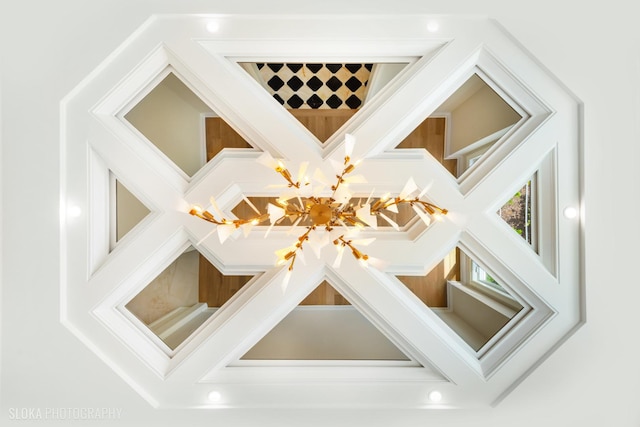 219 Lincoln Dr, Glencoe, IL 60022 - detailed view of a chandelier and crown molding