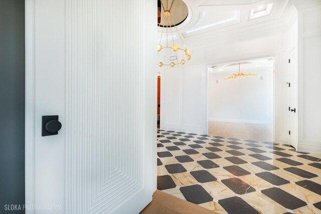 219 Lincoln Dr, Glencoe, IL 60022 - corridor featuring a chandelier