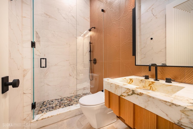 219 Lincoln Dr, Glencoe, IL 60022 - bathroom with vanity, a marble finish shower, and wallpapered walls