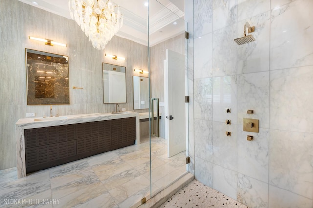 219 Lincoln Dr, Glencoe, IL 60022 - bathroom featuring crown molding, a chandelier, double vanity, a shower with shower door, and tile walls
