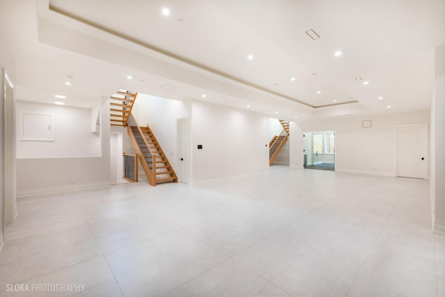 219 Lincoln Dr, Glencoe, IL 60022 - below grade area with stairs, recessed lighting, and light tile patterned flooring