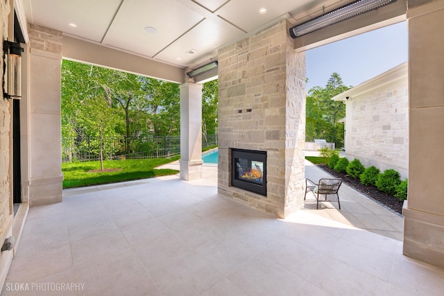219 Lincoln Dr, Glencoe, IL 60022 - view of patio / terrace featuring an outdoor stone fireplace