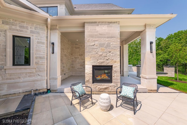 219 Lincoln Dr, Glencoe, IL 60022 - view of patio / terrace featuring an outdoor stone fireplace