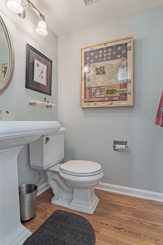 962 Thompson Blvd, Buffalo Grove, IL 60089 - half bathroom featuring wood finished floors
